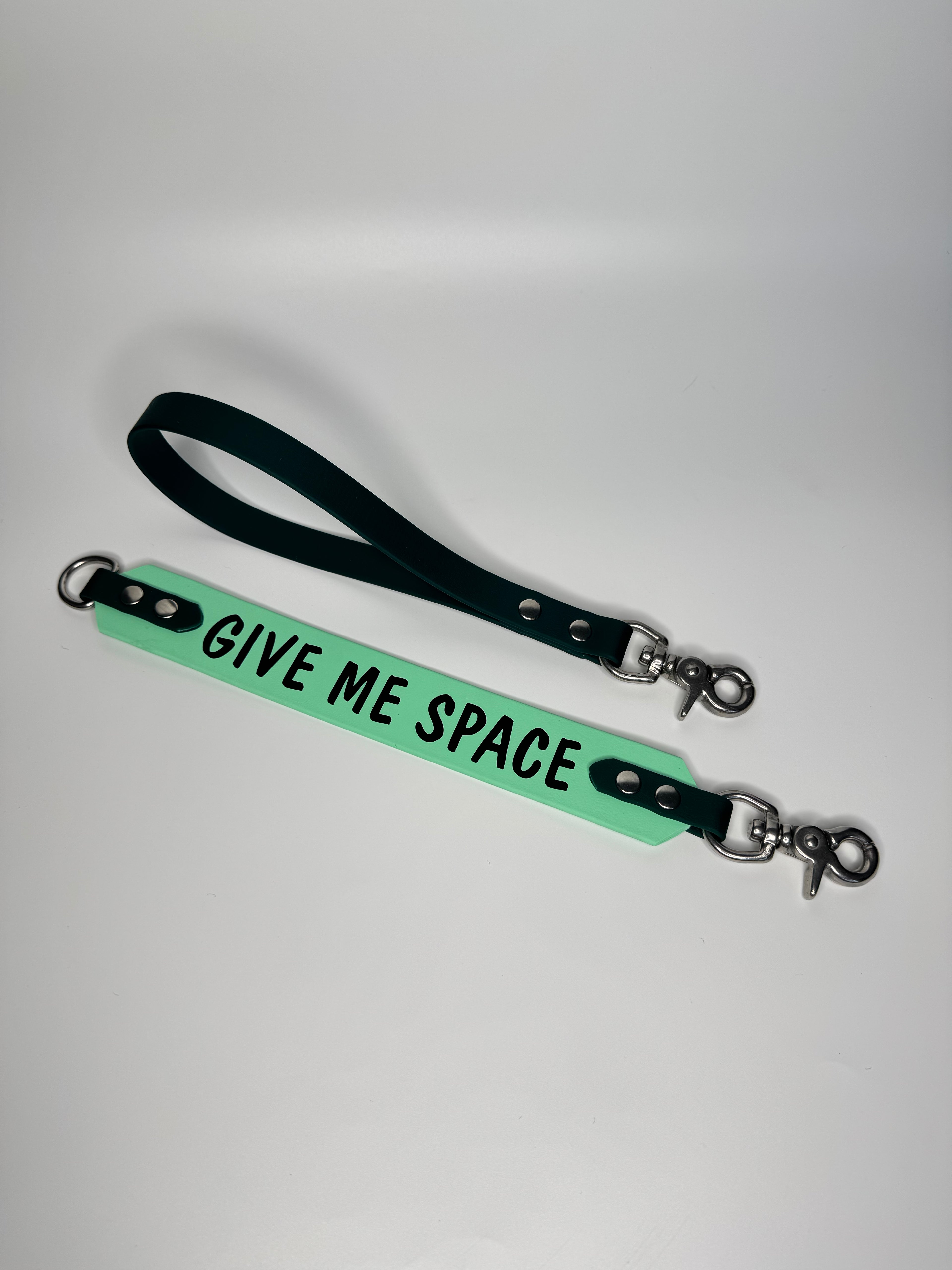 Green and black strap with &